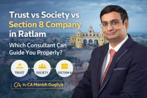 CA Manish Gugliya explaining Trust vs Society vs Section 8 Company in Ratlam with Mahalwada Gate and Ratlam city background